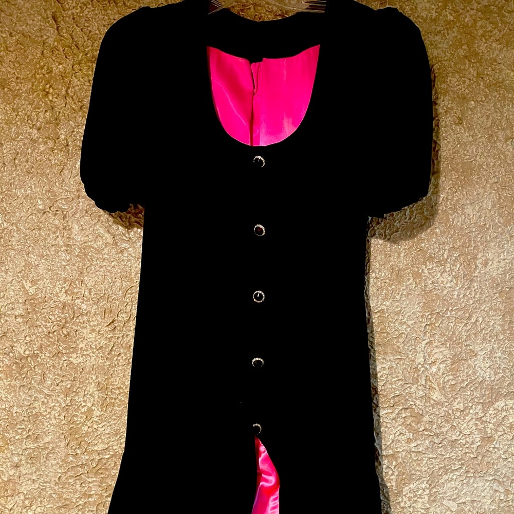 Black velvet dress completely lined in pink satin with rhinestone buttons
